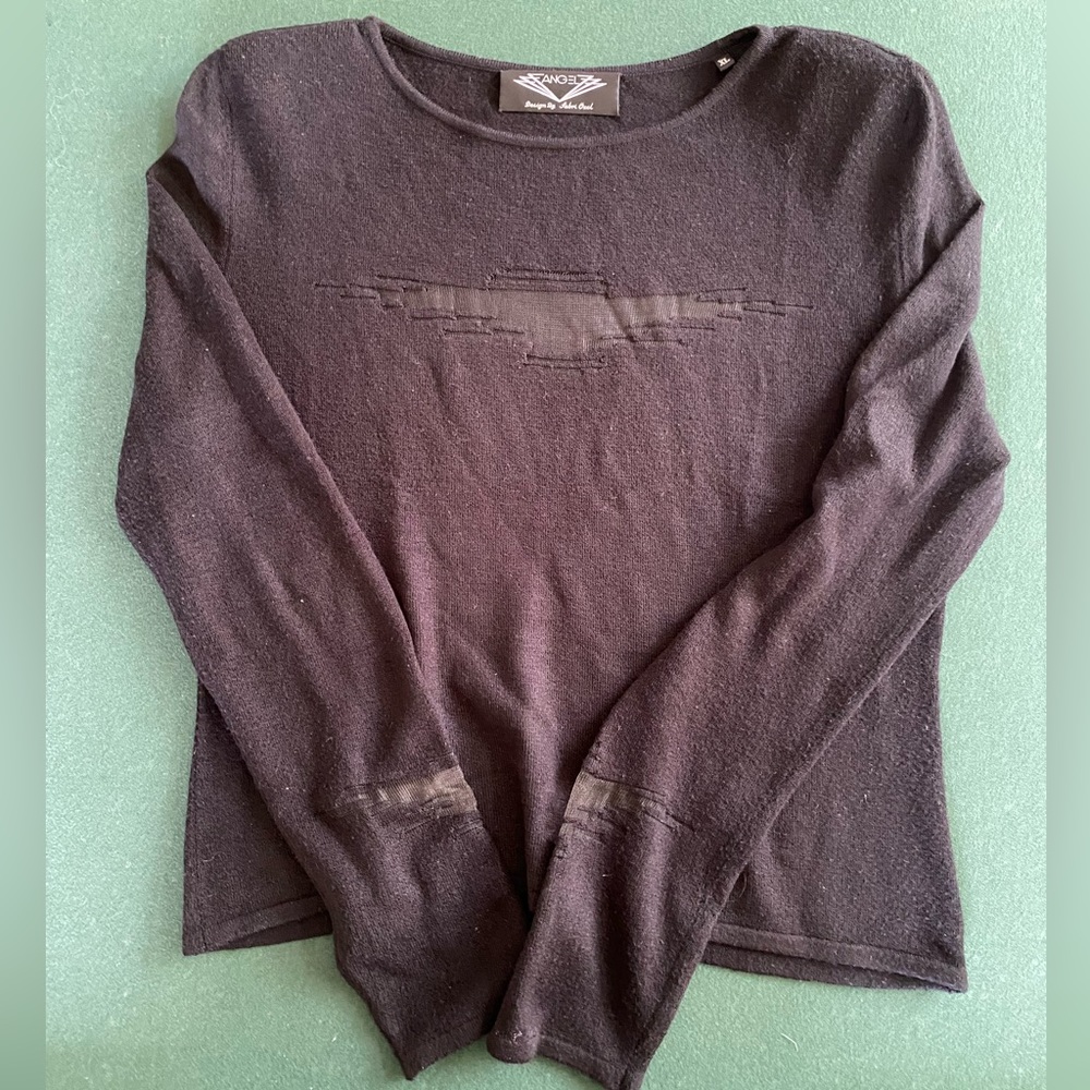 Angel by Sabri Ozel Sweater.  With mesh cutouts at wrists and chest.